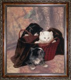 Три котенка в корзине